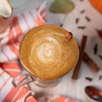 A frothy pumpkin spice latte swirled with cashew cream.