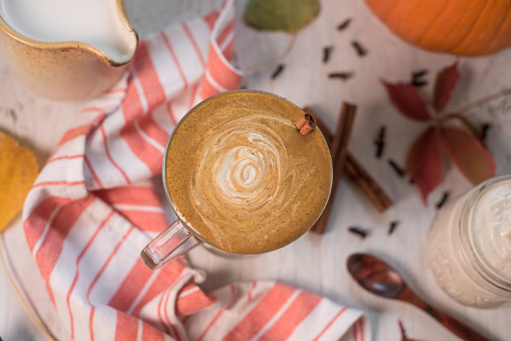 A frothy pumpkin spice latte swirled with cashew cream.