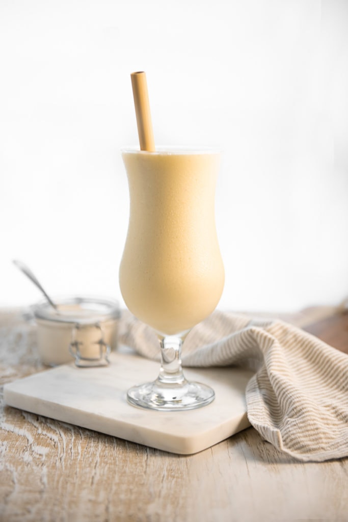 A chilled, yellow Pineapple Smoothie in a Poco Grande Glass.