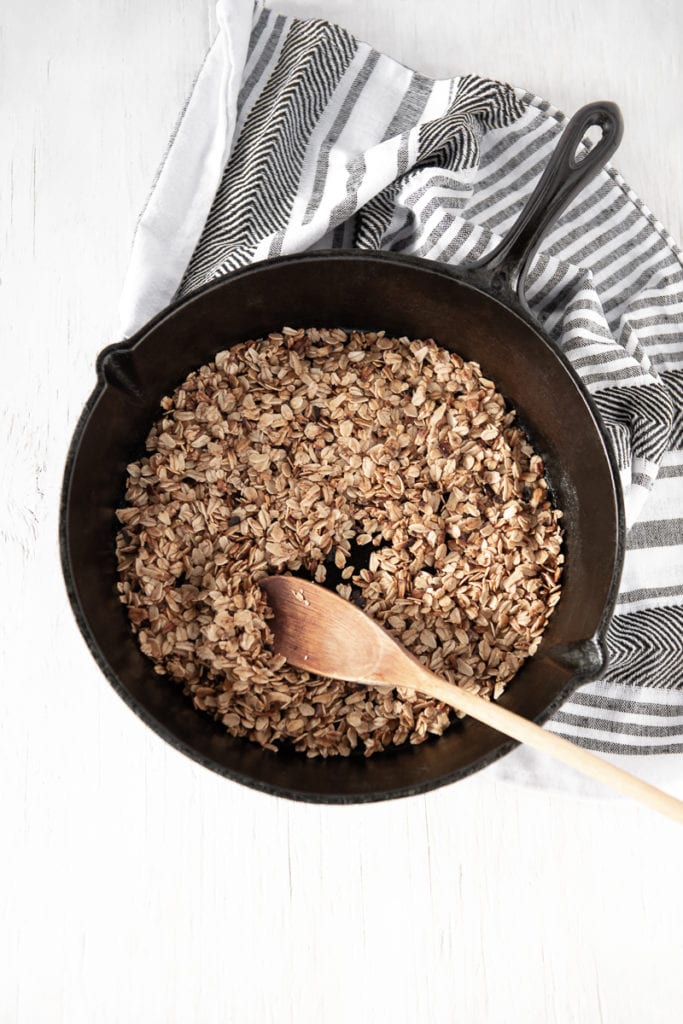 Toasted Granola freshly made in a cast iron pan.