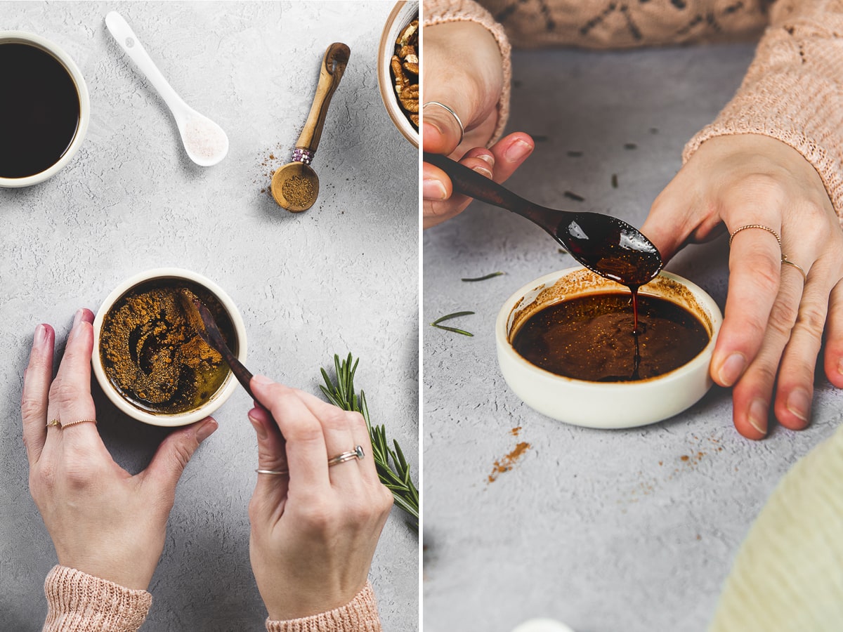 Freshly mixed Cinnamon Balsamic Glaze dripping off a small wooden spoon into a ceramic bowl.