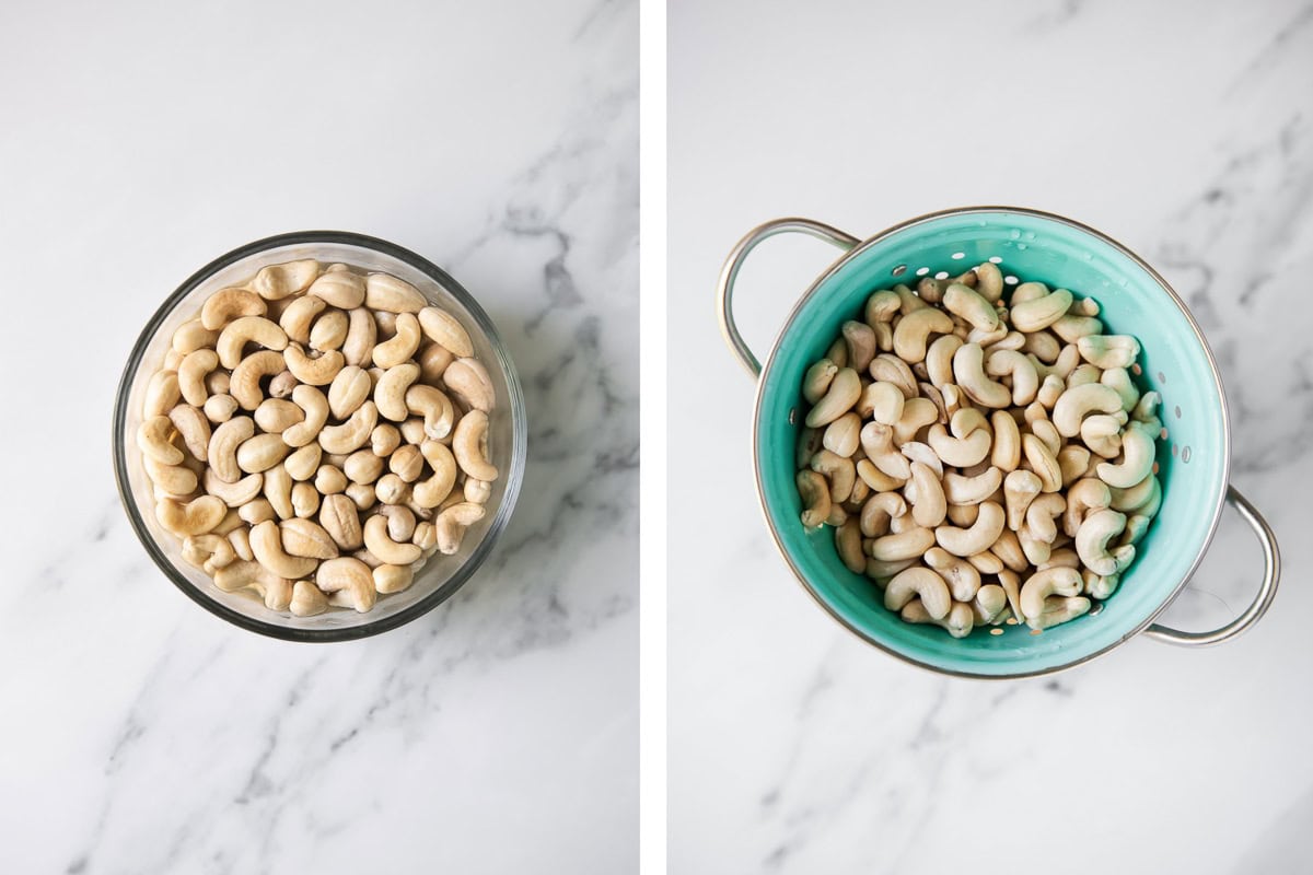 Raw cashews in a bowl of water and a colander filled with soaked and rinsed cashews.