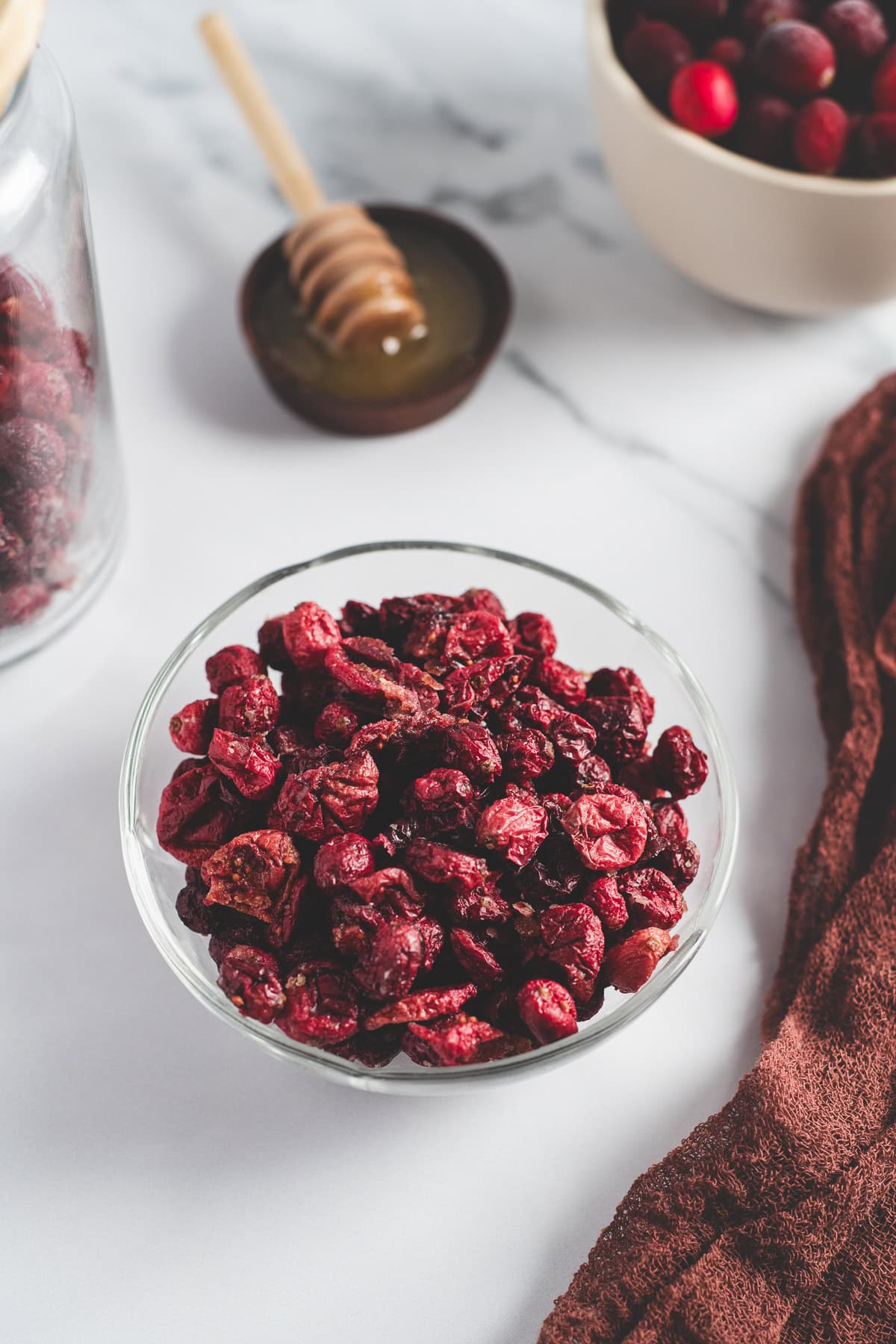 A bowl of oven-dried cranberries.